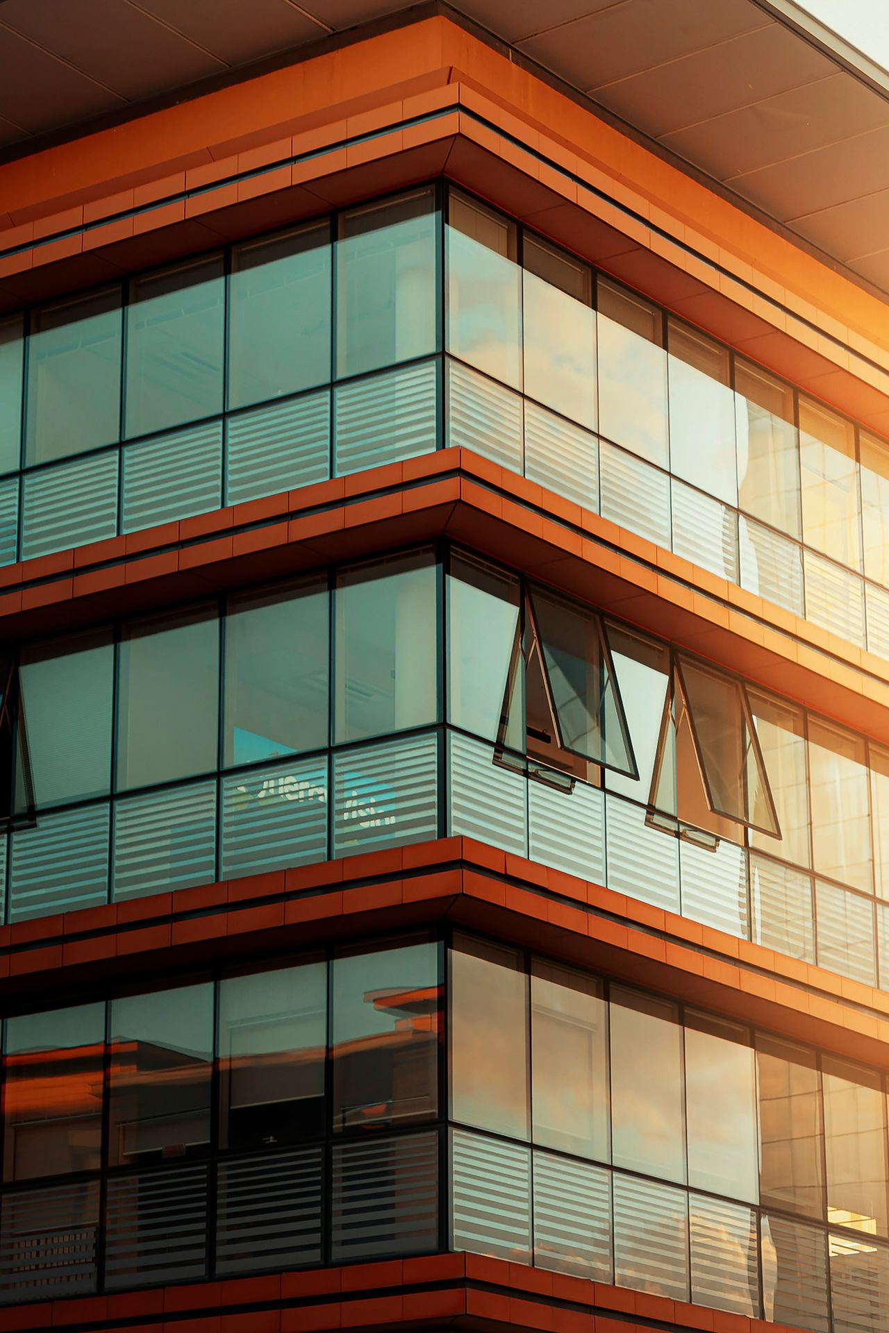 A tall building with lots of windows on top of it